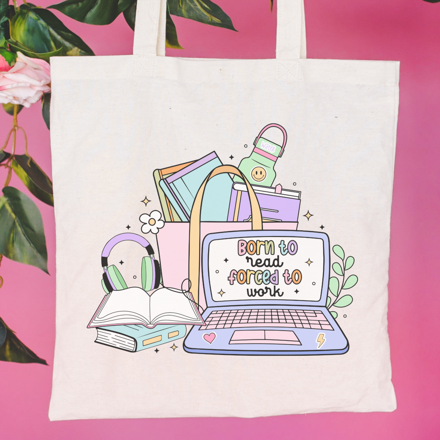 Tote bag with a laptop, books, and headphones illustration on a pink background