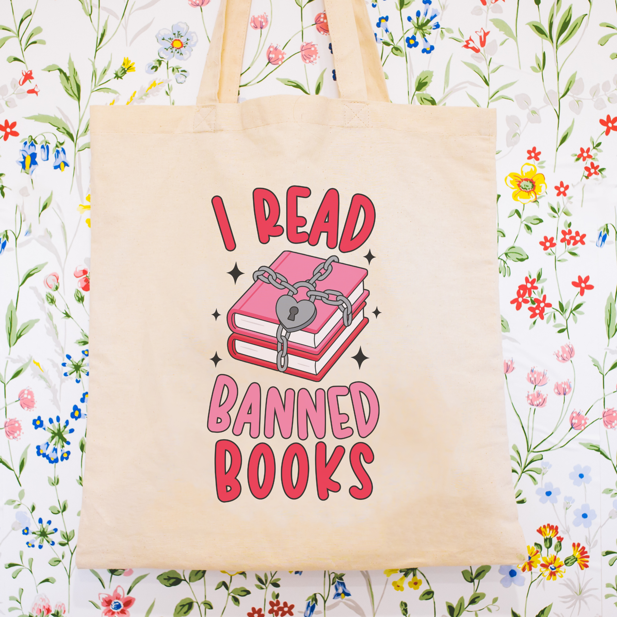 Tote bag with 'I Read Banned Books' design on a colorful background