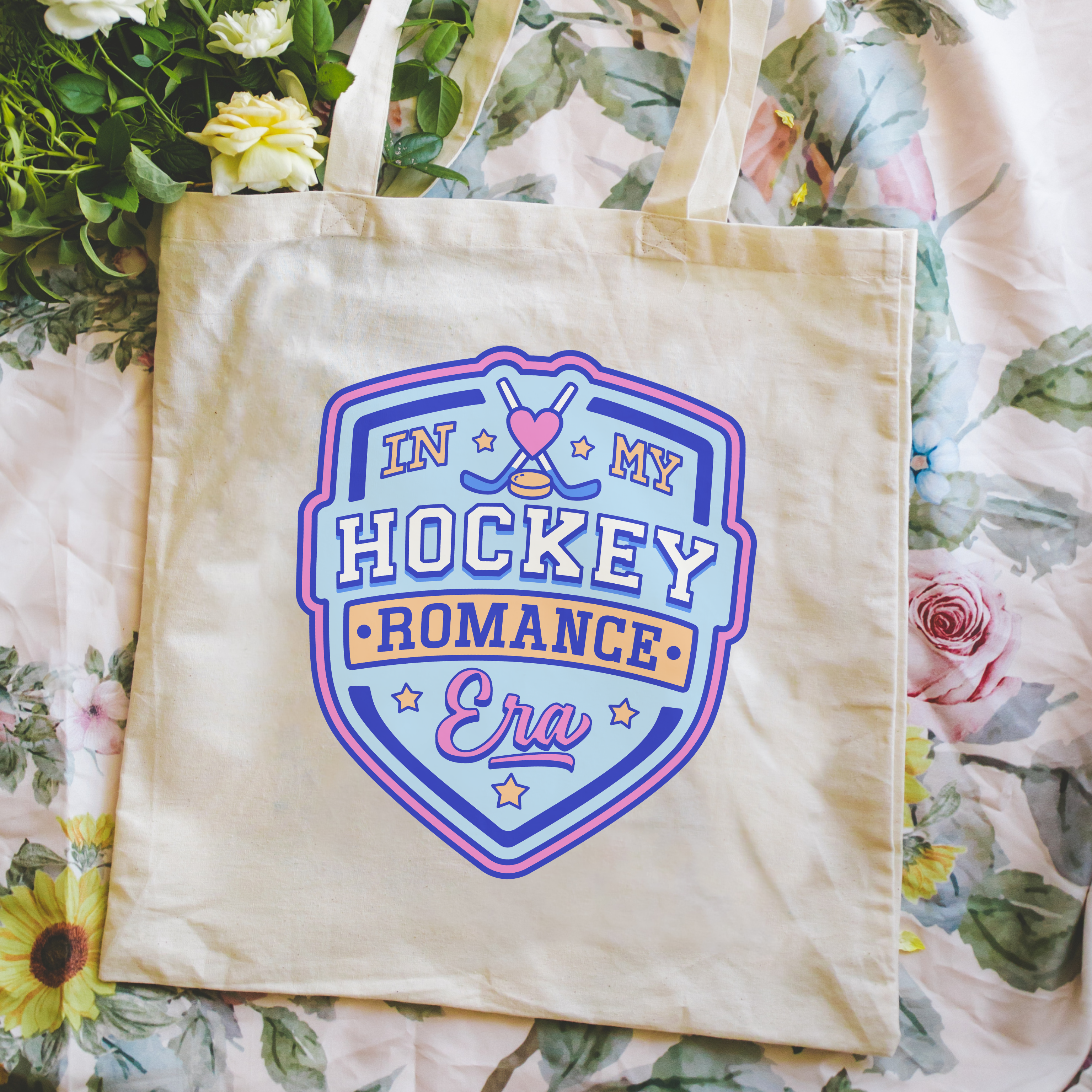Tote bag with 'In My Hockey Romance Era' design on a floral background