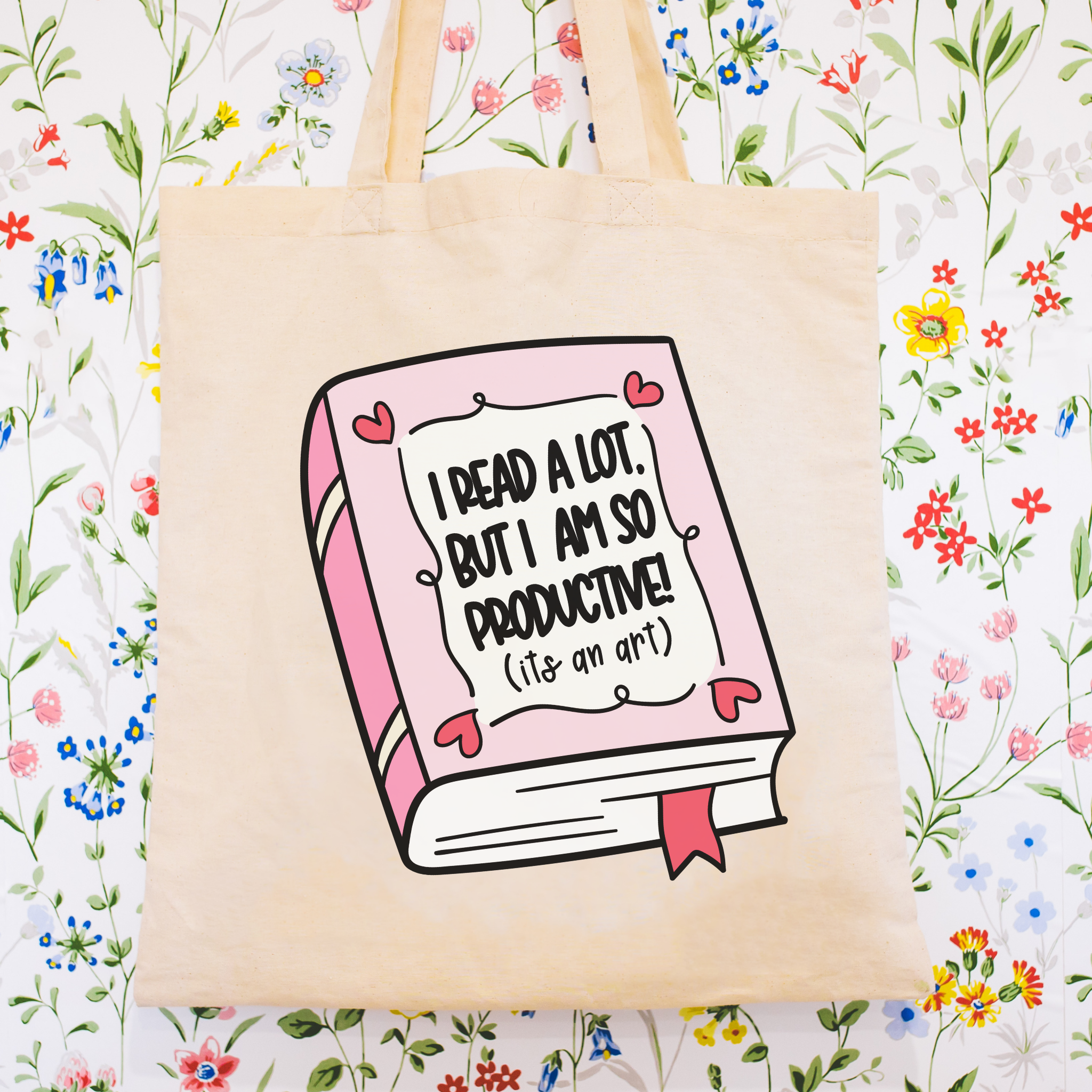 Bookish Tote bag with a book illustration and text on a floral background