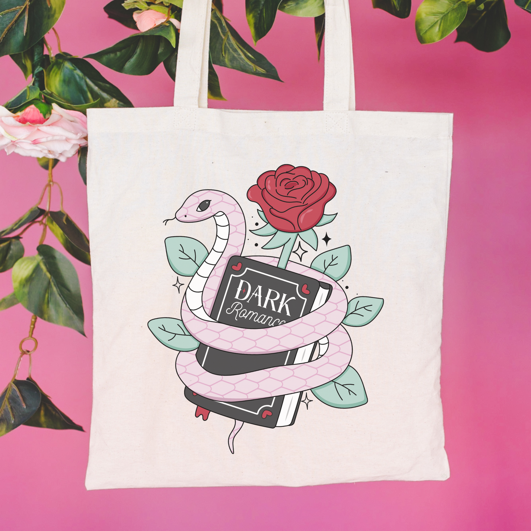 Dark Romance Tote bag with snake and rose design on a pink background