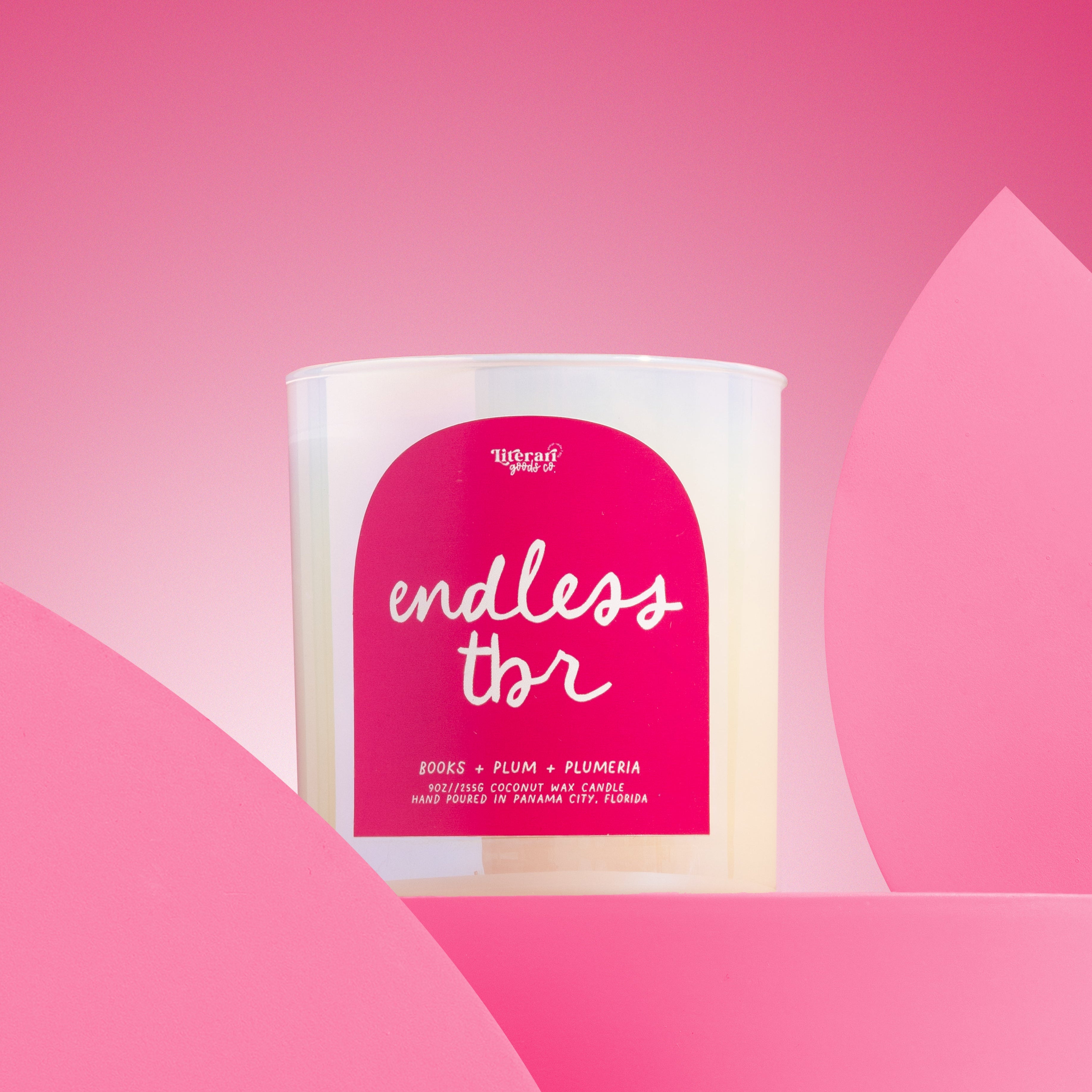 book themed Candle with a pink label on a pink background with text that says "endless tbr"