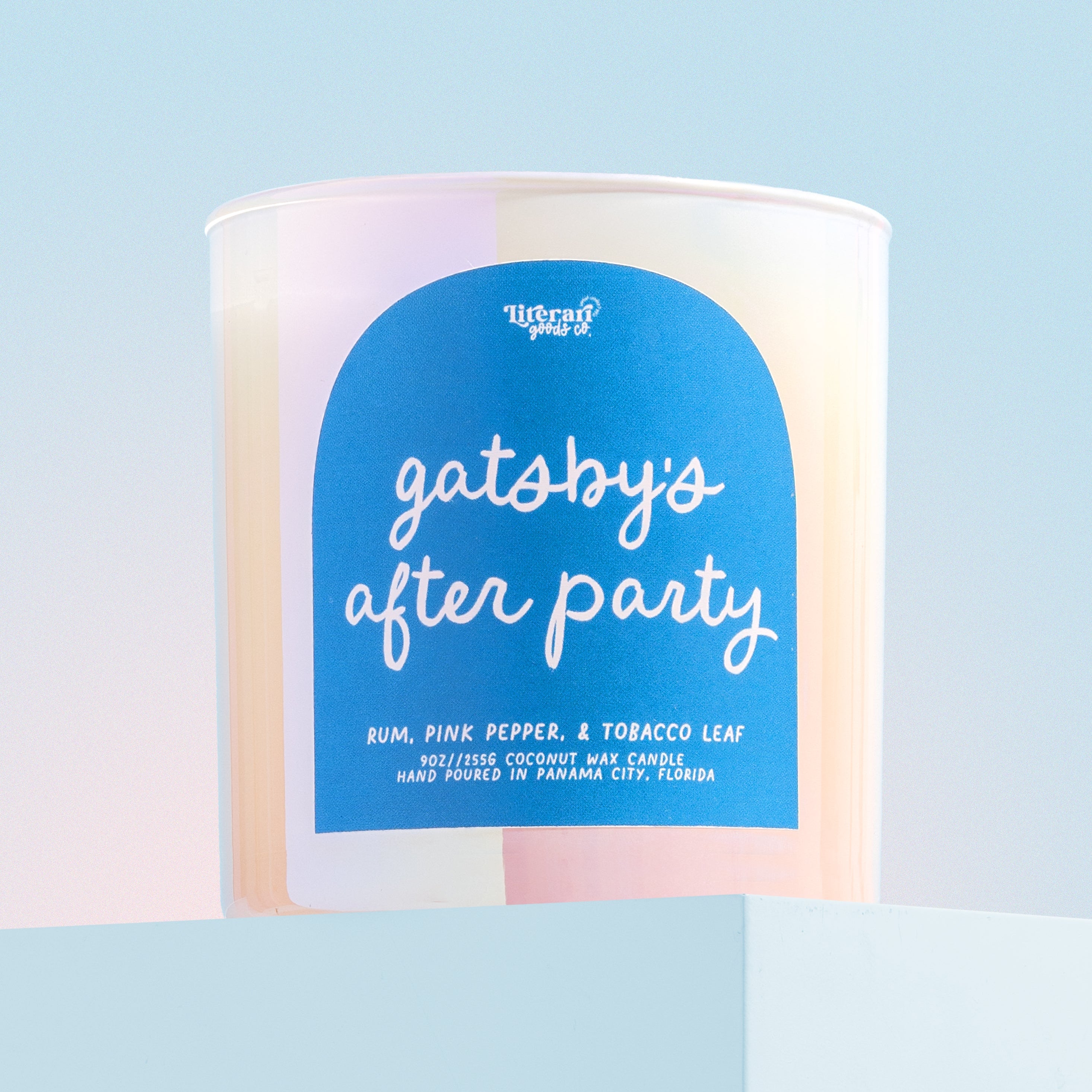 bookish candle, book themed candle on a blue background reading "gatsby's after party"