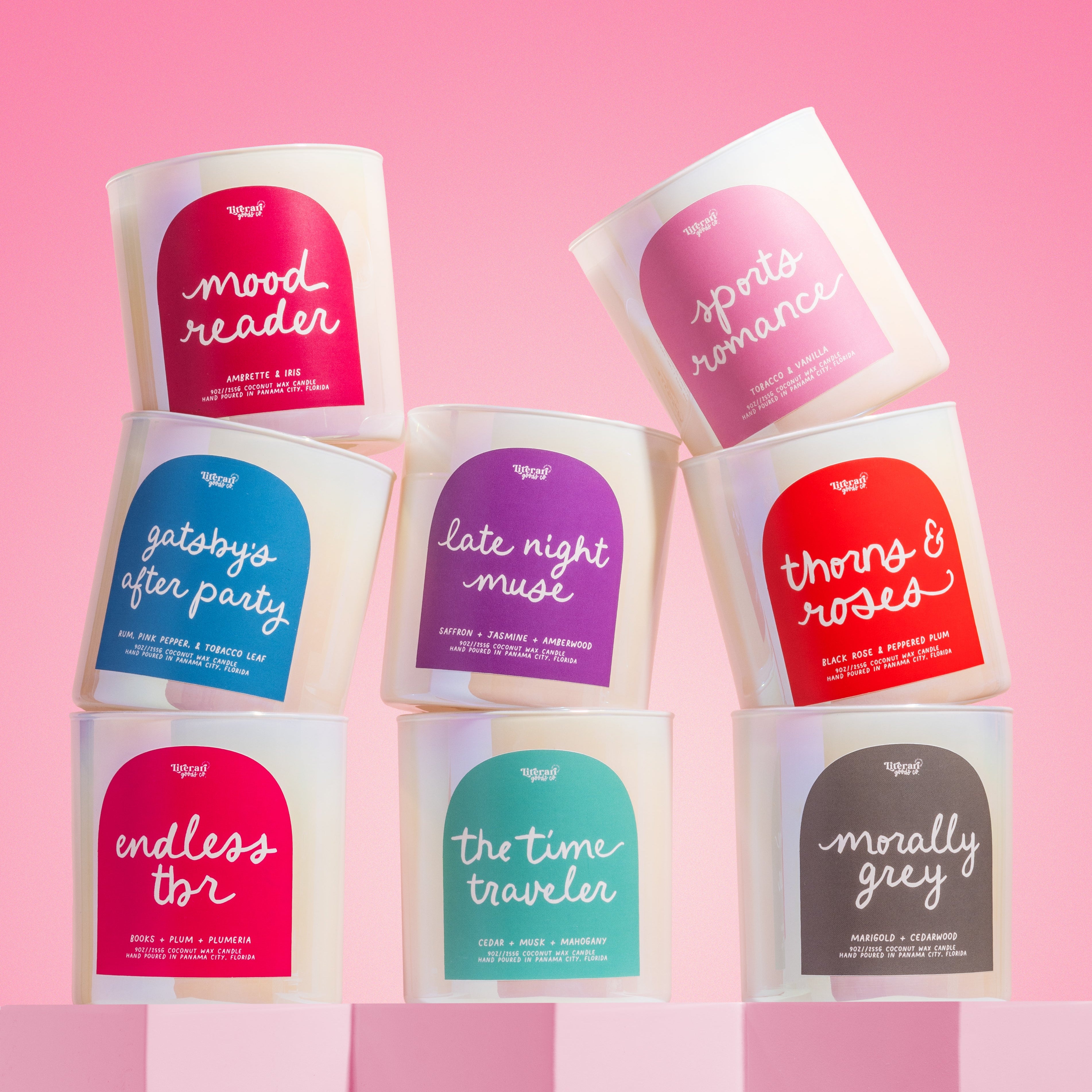 Book themed Candle with a label on a pink background, with label reading "morally grey"