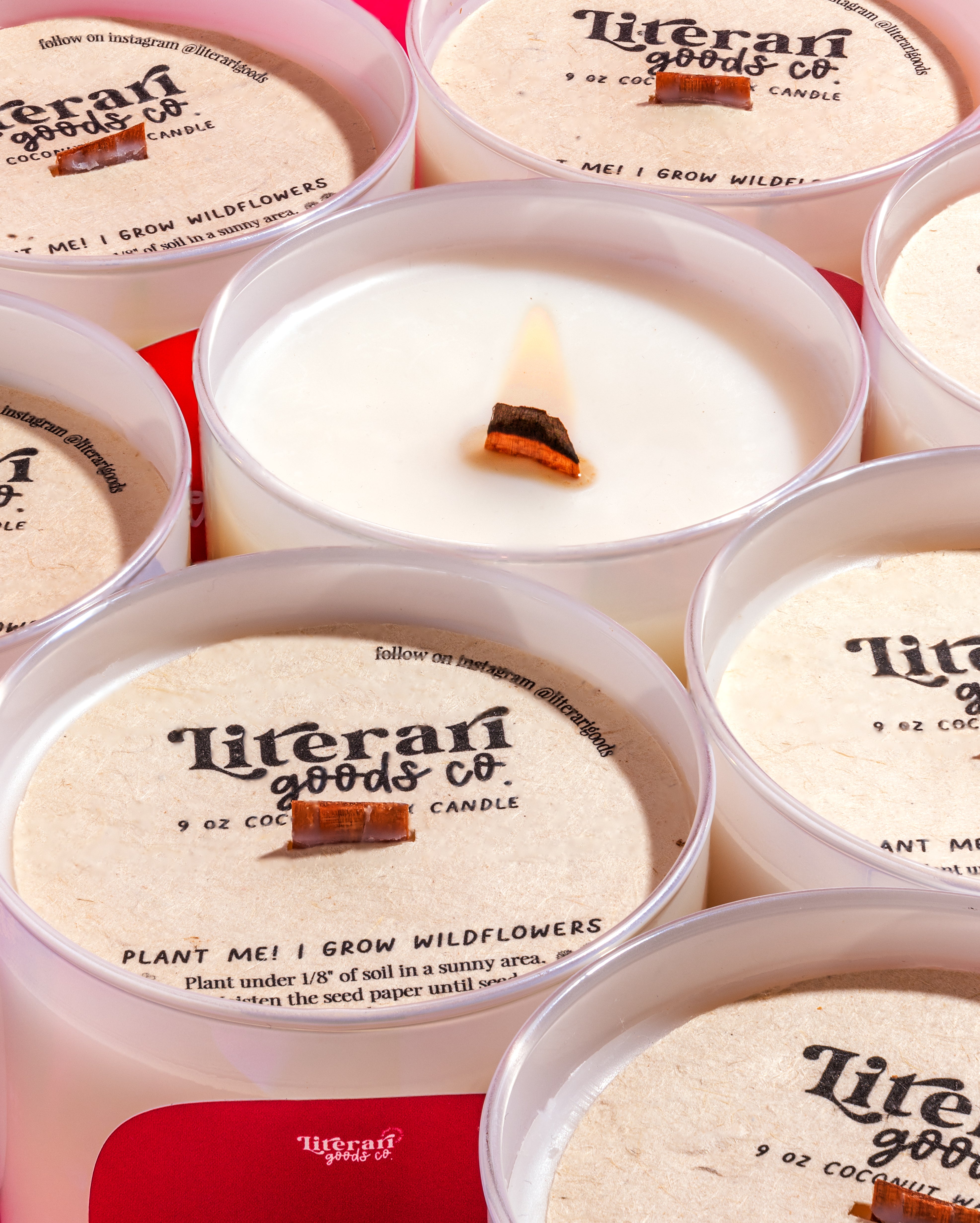 Literran Goods Co candles in packaging with visible branding.